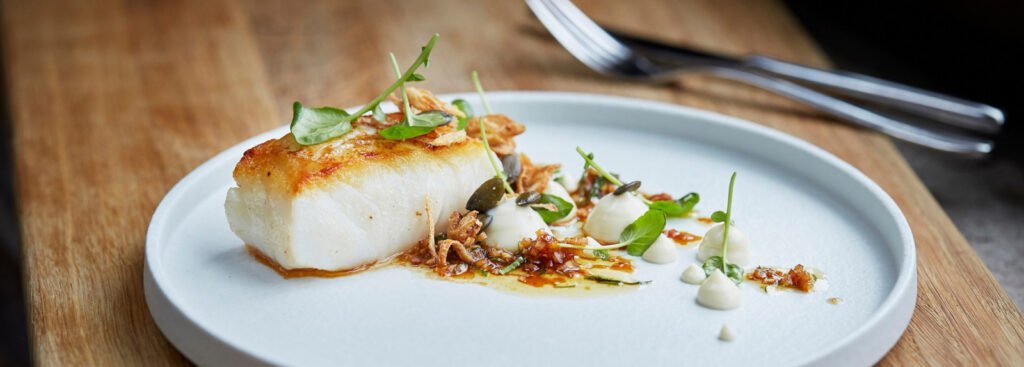 Image de cabillaud Skrei cuisiné selon la recette d'un restaurateur.
